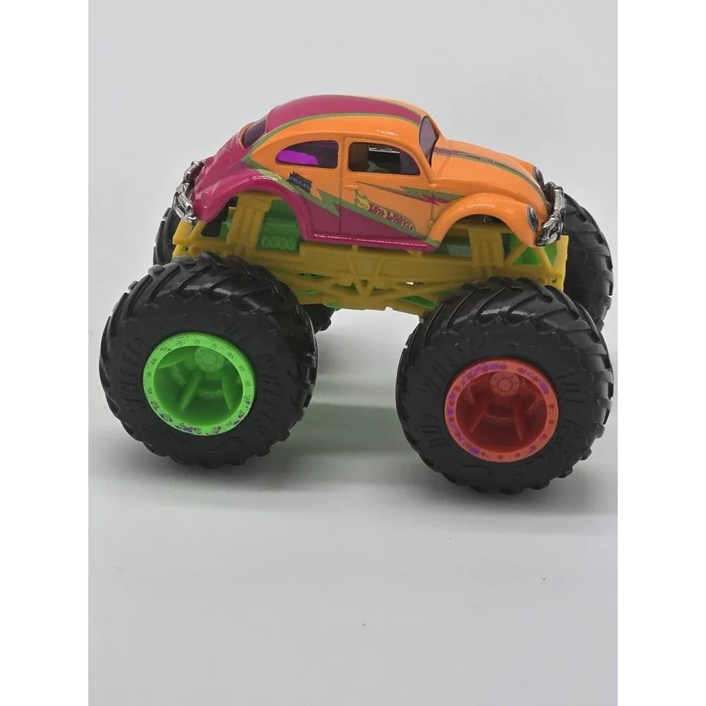 Hot Wheels Monster Trucks VW Beetle Bug Orange w Pink Tampos 1:64 - Mint